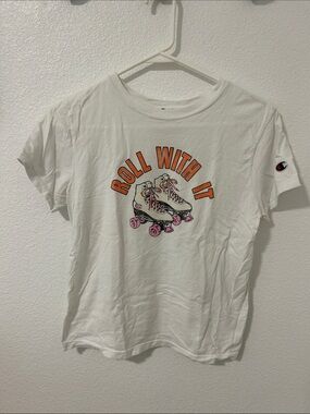 Vintage Champion White Graphic Tee with Orange Text & Pink Skate Wheels